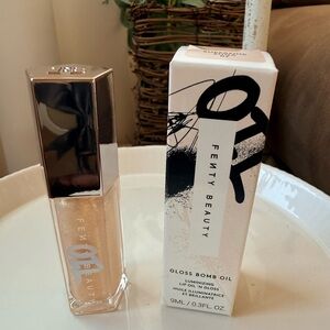 Fenty Beauty Gloss Bomb Oil Luminizing Lip Oil and Gloss in Color Superfine Suga